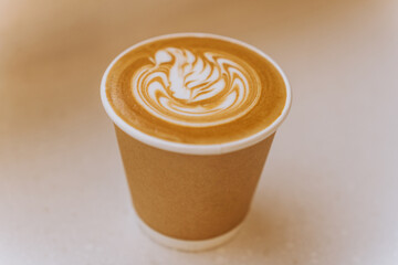 cup of  latte on the withe 