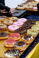 Colorful Donuts Display On Gold Tray