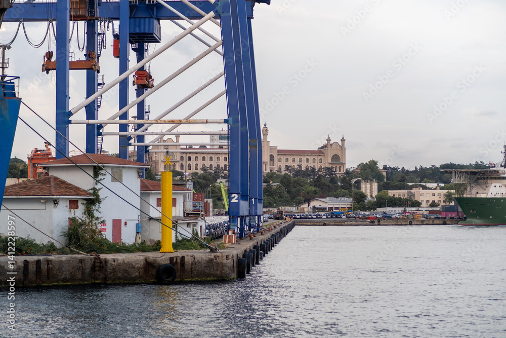 Poster bosphorus waterfront with industrial structures and distant historical architecture at twilight