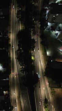 Itaquera neighborhood in S&atilde;o Paulo at night. Aerial view. Vertical video.