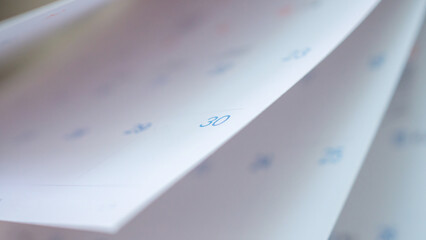 Abstract blur calendar page flipping sheet close up background business schedule planning appointment meeting concept