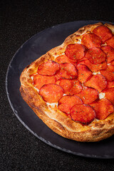 Hot and delicious pepperoni pizza with perfectly crispy edges, ready to be enjoyed immediately