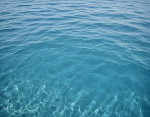 Obraz premium Blue sea water in calm. Clear blue sea - abstract background, wallpaper and texture. selective focus.