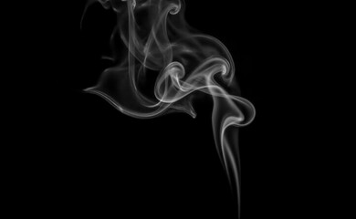 Vertical smoke stream rising on black background with smooth elegant curves and natural flowing movement. graphic element