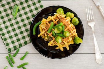 Diet waffles with green vegetables and original serving