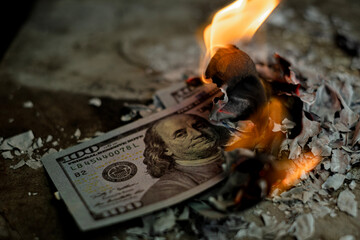 banknote is burning, cash symbolizing business payment and financial success