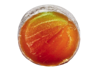 Close-up studio shot of a single, translucent amber-colored candy. The candy exhibits a unique texture and gradient of color, perfect for food, confectionery, or artistic projects.