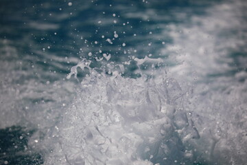 Close-up of water splashes in a tropical ocean, photographed in French Polynesia