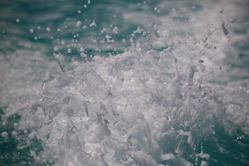 Close-up of water splashes in a tropical ocean, photographed in French Polynesia