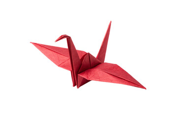 A precisely folded red origami crane with sharp wings and neatly creased paper structure on display, isolated on a transparent background