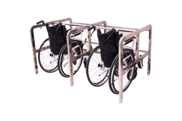 Empty wheelchair black Located in aluminum structure at airport isolated on cut out PNG or transparent background. Devices help disabled people or patients with physical movement problems.
