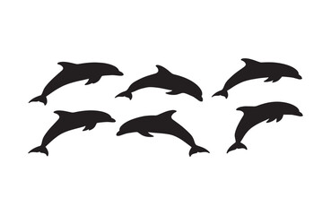 Fototapeta premium Stunning dolphins diving gracefully in silhouette forms