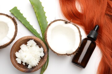Coconut, butter shavings, hair lock, cosmetic product and aloe leaves on white background, flat lay
