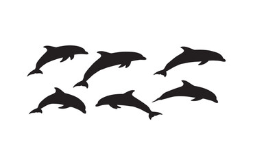 Fototapeta premium Jumping dolphins depicted through powerful silhouette style