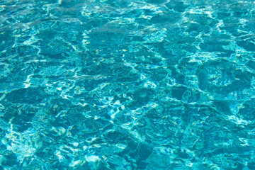 Obraz premium Pool water background, blue wave abstract or rippled water texture background.