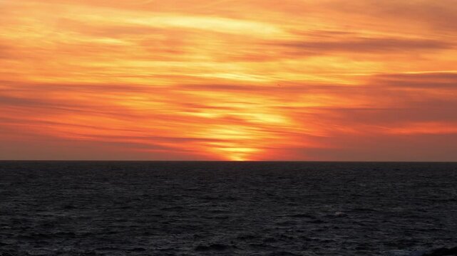 Fiery Spring Sunset Over the Norwegian Sea. Filmed near Lindesnes, where the land sinks into the sea, this cinematic moment evokes the wild power of the elements.