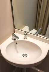 Fototapeta premium bathroom sink with a mirror above it