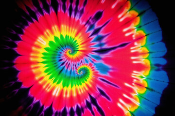 colorful tie dye background with a spiral design