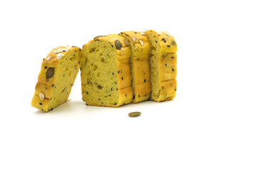 Sliced Pumpkin Bread with Mixed Grains on White Background