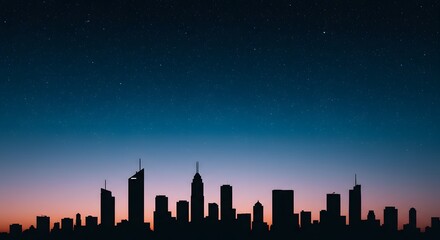 Dramatic skyline silhouette under a beautiful twilight sky filled with bright stars, peaceful.