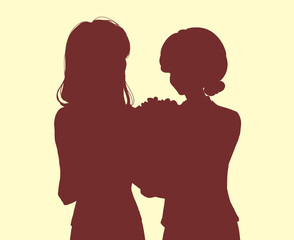 Fototapeta premium 年配の女性に花束を贈る女性 影絵