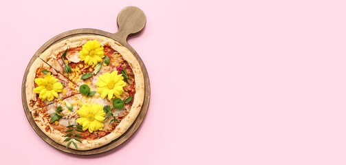 Pizza with beautiful flowers on pink background with space for text, top view