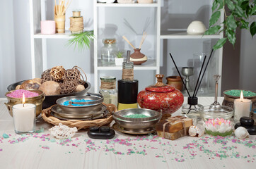 Spa massage items are arranged in a composition on the table.