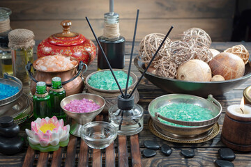 Spa massage items are arranged in a composition on the table.