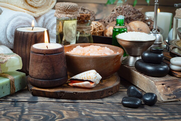 Spa massage items are arranged in a composition on the table.