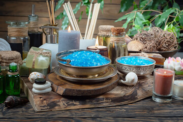 Spa massage items are arranged in a composition on the table.