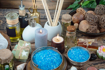 Spa massage items are arranged in a composition on the table.