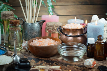 Spa massage items are arranged in a composition on the table.