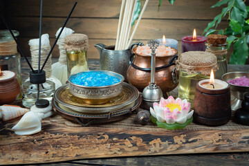 Spa massage items are arranged in a composition on the table.
