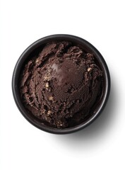 Dark chocolate dessert in a black bowl isolated on white background.