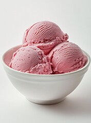 Three scoops of pink ice cream in a white bowl on a white surface.