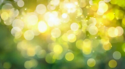 Obraz premium A beautiful abstract background featuring bright bokeh circles, radiating warm yellow and green tones, perfect for festive or nature-themed designs.