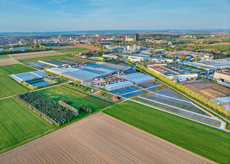 aerial photo of a industrial district between fertile farmland in Kornwestheim, Baden Wuerttemberg,...