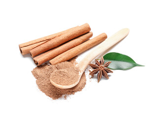 Spoon of powder with cinnamon sticks, anise and leaf on white background