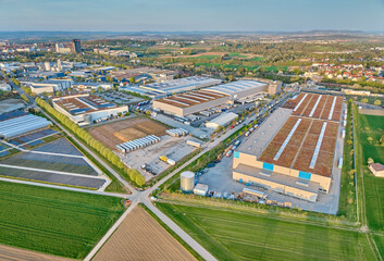 aerial photo of a industrial district between fertile farmland in Kornwestheim, Baden Wuerttemberg,...