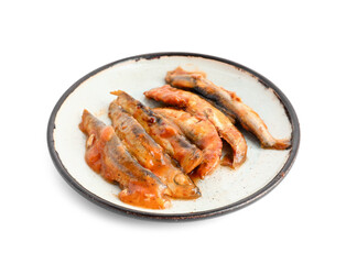 Plate with canned fish in tomato sauce isolated on white background