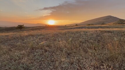 Sunset on the background of hills in the Crimea.