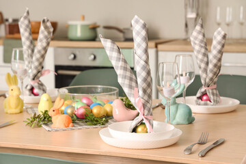 Beautiful table setting for Easter celebration in kitchen