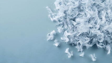 Fototapeta premium Fluffy White Material Texture On Light Blue Background