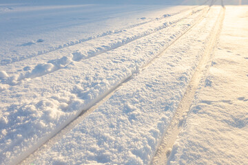 ski track, ski trail goes into the distance, on a clear sunny day, winter sports activity, skiing background