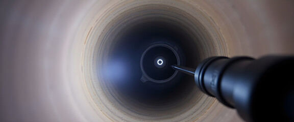 close up of a black object with a light in it