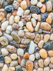 Close-Up View of Various Colorful Pebbles with Varied Textures