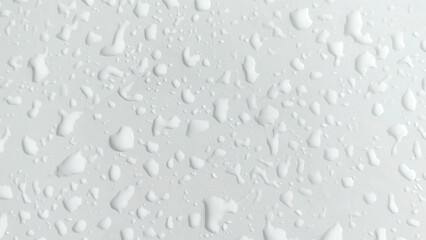 Glistening Water Droplets on a Smooth White car surface