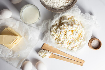 Baking Ingredients: Cottage Cheese, Flour, Milk, Eggs and Butter