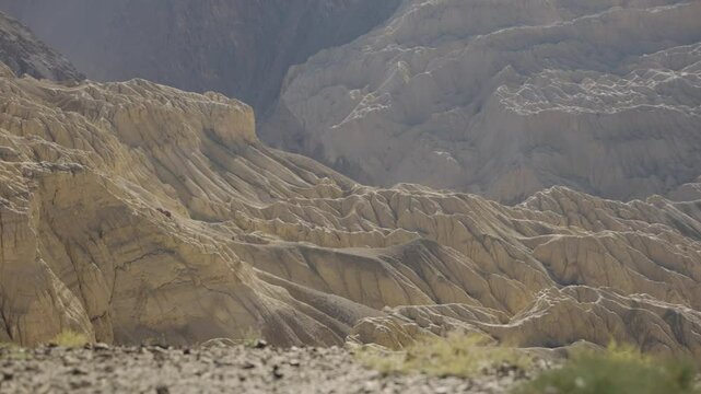 4K footage of Lamayuru Moonland in Kargil Ladakh, India, showcasing a monastery set against a stunning moon-like dry desert backdrop.