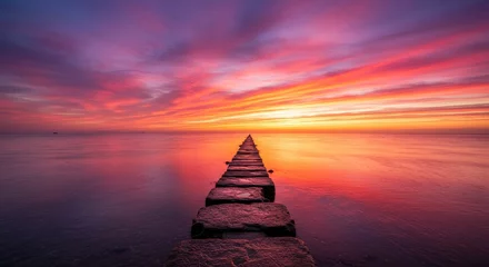 Wandcirkels Paars Serene Sunset Pathway - A tranquil scene of a stone path extending into a vibrant sunset over calm water. Peaceful and serene  © AI Photo Stock